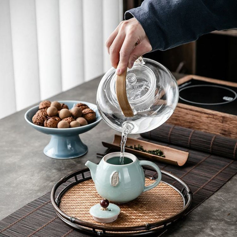 A Vintage Ge Kiln Ceramic Teapot with a Crackled End, Perfect for Creating a Zen-Inspired Tea Ceremony. Great for Decorating And Using at Home, in The Office, Or During Gatherings. an Excellent Gift for The Holidays