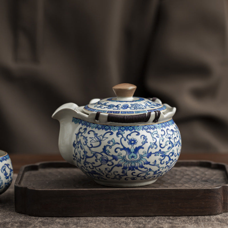 Classic Beige Ru Kiln Blue And White Lotus Ceramic Kung Fu Teapot, Featuring a Hemp Rope Woven Anti-Scald Design. Ideal for Home Or Office Use And Decoration, Perfect As a Holiday Gift for Friends