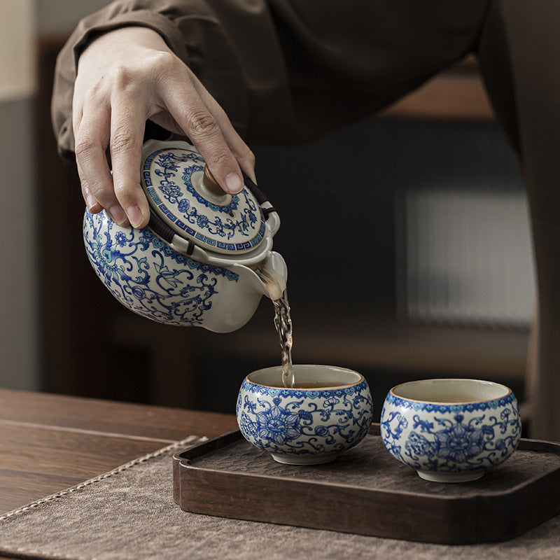Classic Beige Ru Kiln Blue And White Lotus Ceramic Kung Fu Teapot, Featuring a Hemp Rope Woven Anti-Scald Design. Ideal for Home Or Office Use And Decoration, Perfect As a Holiday Gift for Friends