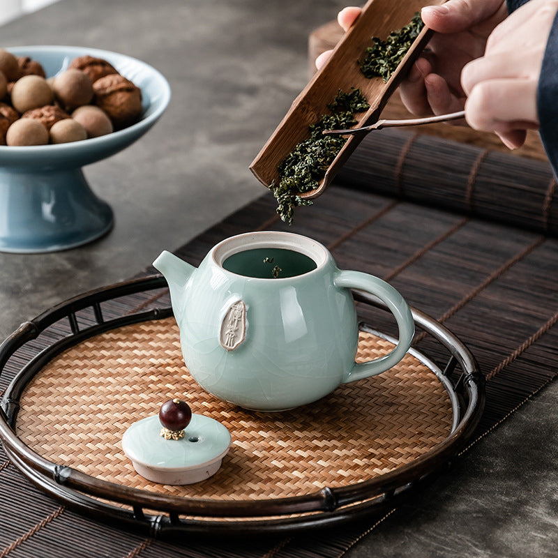 A Vintage Ge Kiln Ceramic Teapot with a Crackled End, Perfect for Creating a Zen-Inspired Tea Ceremony. Great for Decorating And Using at Home, in The Office, Or During Gatherings. an Excellent Gift for The Holidays