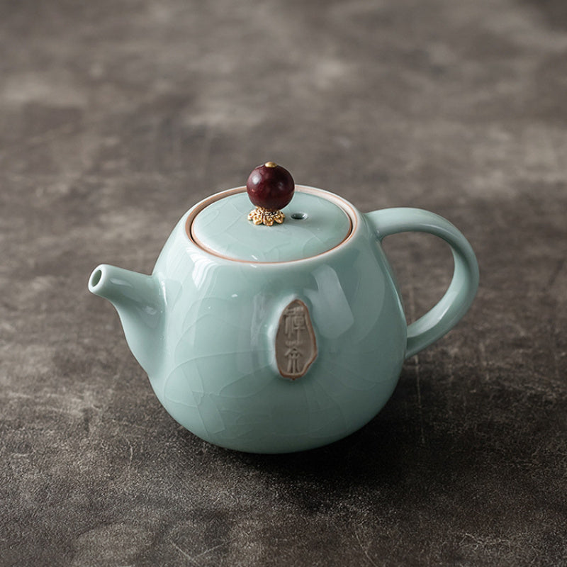 A Vintage Ge Kiln Ceramic Teapot with a Crackled End, Perfect for Creating a Zen-Inspired Tea Ceremony. Great for Decorating And Using at Home, in The Office, Or During Gatherings. an Excellent Gift for The Holidays